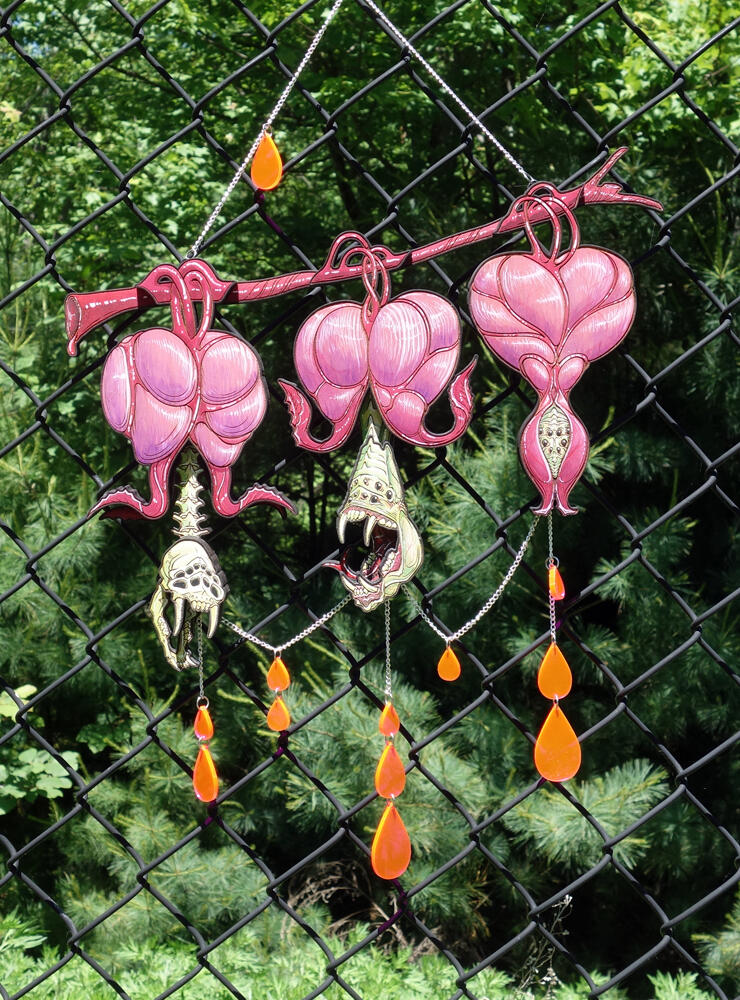 bleeding hearts with gnashing teeth and blood drops, wood and watercolor with acrylic accents.